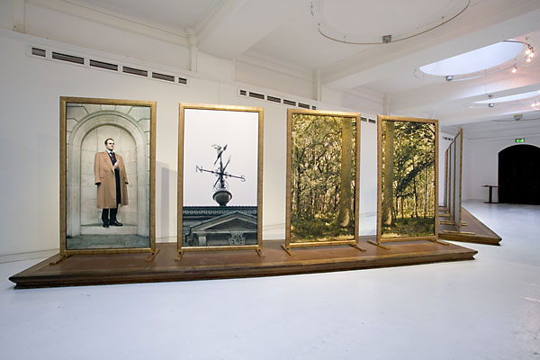 Enchanged Forest installation shot showing the first four 6 foot tall images on display on a plinth in Throgmorton Gallery.